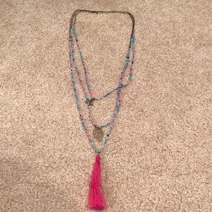 Layered boho beaded and charm necklace